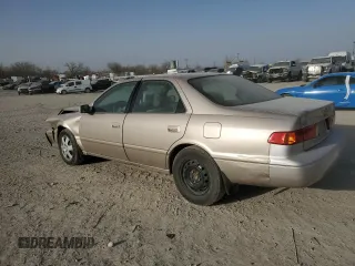 2001 Toyota Camry CE with VIN 4T1BG22K31U779463, listed as a Copart auction lot 48404105 with 153,702 mi miles and Salvage Title. Bid and sale history available at carsss.com. Image 2.