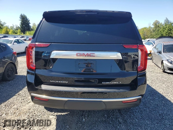 2023 GMC Yukon Denali with VIN 1GKS2DKT9PR158736, listed as a Copart auction lot 69765034 with 22,042 mi miles and Salvage Title. Bid and sale history available at carsss.com. Image 6.