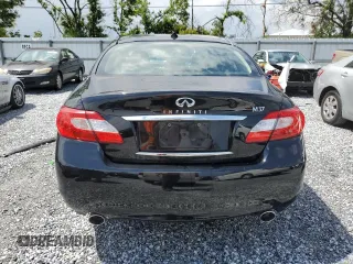 2013 Infiniti M with VIN JN1BY1AP7DM512603, listed as a Copart auction lot 57581585 with 119,274 mi miles and Salvage title. Bid and sale history available at DreamBid. Image 6.