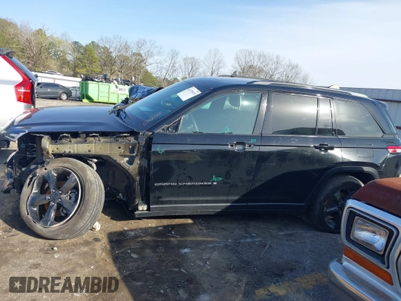 2024 Jeep Grand Cherokee Laredo X with VIN 1C4RJGAG7RC142320, listed as a IAAI auction lot 41709639 with 30,336 mi miles and . Bid and sale history available at DreamBid. Image 14.