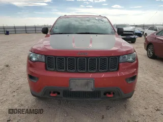2018 Jeep Grand Cherokee Trailhawk with VIN 1C4RJFLGXJC477597, listed as a Copart auction lot 56338075 with 91,443 mi miles and Salvage title. Bid and sale history available at DreamBid. Image 5.