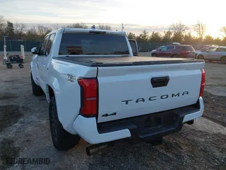 2024 Toyota Tacoma 4WD SR5 with VIN 3TMLB5JN4RM025976, listed as a IAAI auction lot 41073693 with 14,215 mi miles. Bid and sale history available at carsss.com. Image 3.