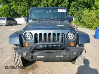 2008 Jeep Wrangler Unlimited Sahara with VIN 1J8GA59108L633332, listed as a Copart auction lot 64613375 with 191,918 mi miles and Clean title. Bid and sale history available at DreamBid. Image 5.