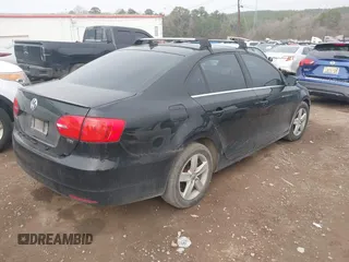 2012 Volkswagen Jetta TDI w/Premium with VIN 3VWLL7AJ1CM360400, listed as a IAAI auction lot 41462201 with 269,351 mi miles and . Bid and sale history available at DreamBid. Image 4.