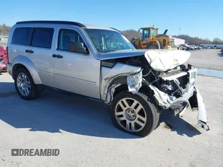 2010 Dodge Nitro Heat z VIN 1D4PU4GK4AW157565, wystawiony jako IAAI lot #41851400 z przebiegiem 209 535 mil mil oraz . Historia ofert i sprzedaży dostępna na DreamBid. Obrazek 1.
