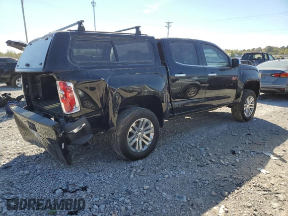 2015 GMC Canyon 2WD SLT with VIN 1GTG5CE33F1217419, listed as a Copart auction lot 73467364 with 114,542 mi miles and Salvage Title. Bid and sale history available at carsss.com. Image 3.