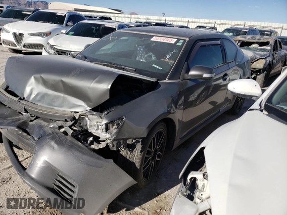 2012 Scion tC z VIN JTKJF5C71C3040608, wystawiony jako Copart lot #53704565 z przebiegiem Nie podano mil oraz Szkoda całkowita • Salvage title. Historia ofert i sprzedaży dostępna na DreamBid. Obrazek 1.