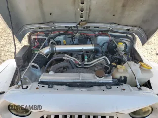 2005 Jeep Wrangler X с VIN 1J4FA39S45P353119, выставлен на аукционе Copart как лот 64206825 с пробегом 134 298 миль миль и Списание • Salvage title. История ставок и продаж доступна на DreamBid. Изображение 11.