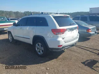 2012 Jeep Grand Cherokee Laredo with VIN 1C4RJEAG5CC106203, listed as a IAAI auction lot 41821138 with 157,474 mi miles. Bid and sale history available at carsss.com. Image 3.