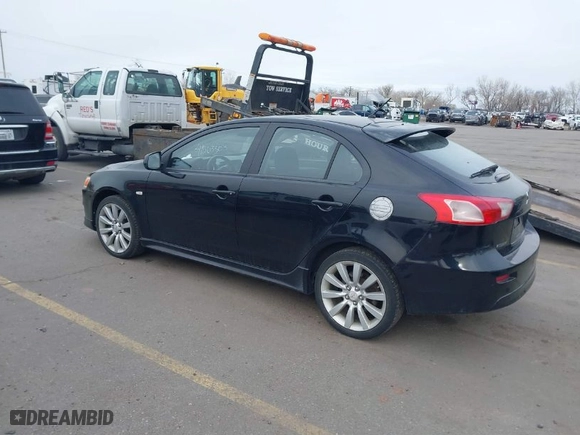 2010 Mitsubishi Lancer GTS with VIN JA32X8HWXAU004111, listed as a IAAI auction lot 41563303 with 198,931 mi miles. Bid and sale history available at carsss.com. Image 3.