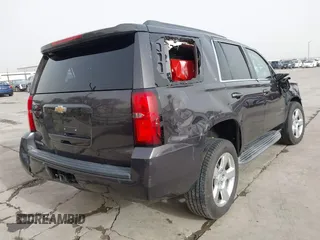 2015 Chevrolet Tahoe LT with VIN 1GNSCBKC5FR504459, listed as a IAAI auction lot 41689405 with 141,783 mi miles and . Bid and sale history available at DreamBid. Image 4.