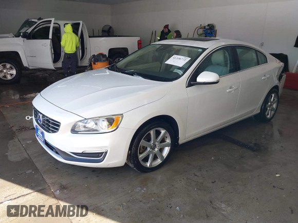 2016 Volvo S60 T5 Drive-E Premier with VIN YV126MFKXG2410966, listed as a IAAI auction lot 41308772 with 262,816 mi miles. Bid and sale history available at carsss.com. Image 19.