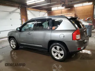 2011 Jeep Compass Latitude with VIN 1J4NF1FB9BD207804, listed as a Copart auction lot 53049285 with 168,163 mi miles and Salvage Title. Bid and sale history available at carsss.com. Image 2.