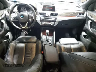 2018 BMW X1 xDrive28i with VIN WBXHT3C32J5F89399, listed as a Copart auction lot 52505945 with 63,677 mi miles and Salvage Title. Bid and sale history available at carsss.com. Image 8.
