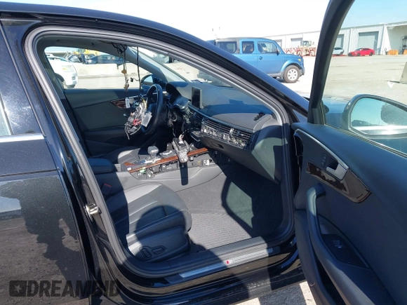 2019 Audi A4 Premium z VIN WAUDNAF40KA024392, wystawiony jako IAAI lot #41045566 z przebiegiem 56 419 mil mil oraz . Historia ofert i sprzedaży dostępna na DreamBid. Obrazek 5.
