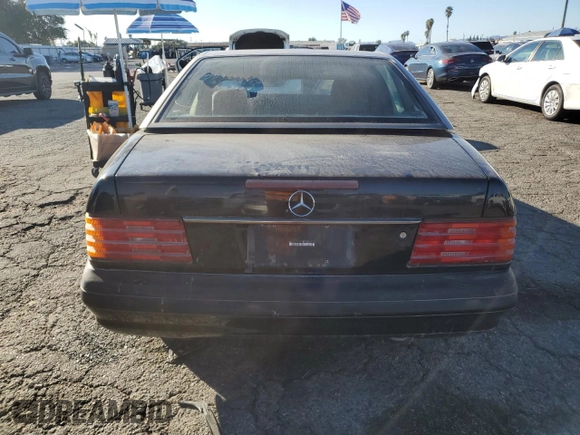 1997 Mercedes-Benz SL 500 z VIN WDBFA63F5VF144026, wystawiony jako Copart lot #80580024 z przebiegiem 138 776 mil mil oraz Czysty tytuł • Clean title. Historia ofert i sprzedaży dostępna na DreamBid. Obrazek 6.
