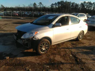 2012 Nissan Versa SV with VIN 3N1CN7AP4CL879273, listed as a IAAI auction lot 41316515 with 104,147 mi miles. Bid and sale history available at carsss.com. Image 2.