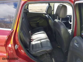 2016 Ford Escape Titanium with VIN 1FMCU9J9XGUC71696, listed as a IAAI auction lot 41651168 with 108,856 mi miles. Bid and sale history available at carsss.com. Image 8.