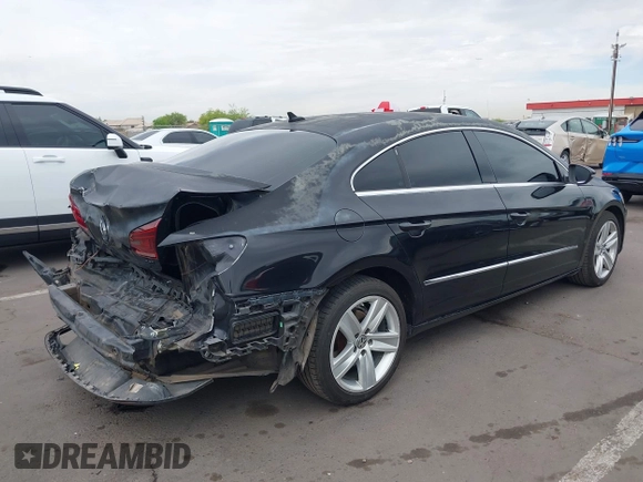 2013 Volkswagen CC Sport with VIN WVWBP7AN6DE504679, listed as a IAAI auction lot 42034362 with 148,527 mi miles. Bid and sale history available at carsss.com. Image 4.
