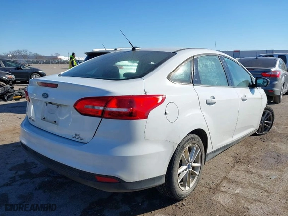 2016 Ford Focus SE with VIN 1FADP3F25GL373234, listed as a IAAI auction lot 41414976 with 150,243 mi miles. Bid and sale history available at carsss.com. Image 4.