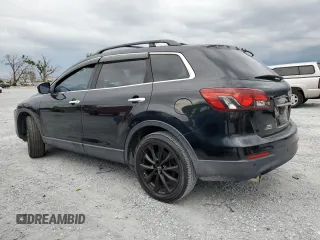 2015 Mazda CX-9 Grand Touring z VIN JM3TB2DA8F0457807, wystawiony jako Copart lot #61803555 z przebiegiem 110 104 mil mil oraz Czysty tytuł • Clean title. Historia ofert i sprzedaży dostępna na DreamBid. Obrazek 2.