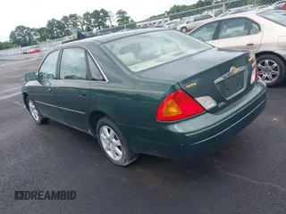 2000 Toyota Avalon XL z VIN 4T1BF28B6YU036865, wystawiony jako IAAI lot #42402305 z przebiegiem 202 265 mil mil oraz . Historia ofert i sprzedaży dostępna na DreamBid. Obrazek 3.