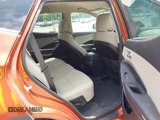 2017 Hyundai Santa Fe 2.4L z VIN 5XYZUDLB1HG463416, wystawiony jako IAAI lot #42546637 z przebiegiem 81 963 mil mil oraz . Historia ofert i sprzedaży dostępna na DreamBid. Obrazek 8.
