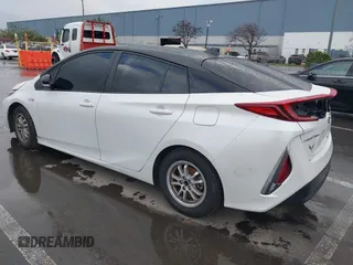 2021 Toyota Prius LE with VIN JTDKAMFP0M3169019, listed as a IAAI auction lot 41481098 with 84,304 mi miles and . Bid and sale history available at DreamBid. Image 3.