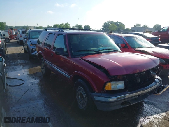 1995 GMC Jimmy SLE z VIN 1GKDT13W1SK528155, wystawiony jako IAAI lot #42177589 z przebiegiem 283 900 mil mil oraz . Historia ofert i sprzedaży dostępna na DreamBid. Obrazek 1.