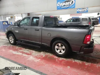 2018 Ram 1500 Express with VIN 1C6RR7FG6JS282197, listed as a Copart auction lot 82840704 with 150,019 mi miles and Salvage title. Bid and sale history available at DreamBid. Image 2.