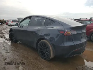 2024 Tesla Model Y Long Range with VIN 7SAYGAEE7RF043096, listed as a Copart auction lot 46939395 with 12,521 mi miles and Salvage Title. Bid and sale history available at DreamBid. Image 2.