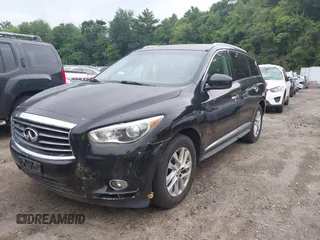 2015 Infiniti QX60 with VIN 5N1AL0MMXFC553802, listed as a IAAI auction lot 42703137 with 168,685 mi miles and . Bid and sale history available at DreamBid. Image 2.