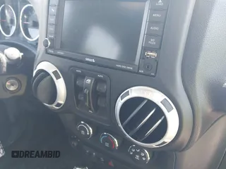 2014 Jeep Wrangler Unlimited Sahara with VIN 1C4BJWEG5EL326980, listed as a IAAI auction lot 42031659 with 116,181 mi miles and . Bid and sale history available at DreamBid. Image 20.
