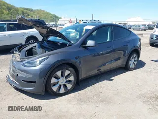 2023 Tesla Model Y Long Range z VIN 7SAYGDEE8PA191415, wystawiony jako IAAI lot #42155577 z przebiegiem 42 149 mil mil oraz . Historia ofert i sprzedaży dostępna na DreamBid. Obrazek 20.