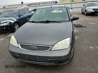 2005 Ford Focus S with VIN 3FAFP37N75R120187, listed as a Copart auction lot 57390605 with 163,547 mi miles and Salvage title. Bid and sale history available at DreamBid. Image 13.