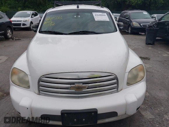 2011 Chevrolet HHR LS z VIN 3GCAAAFWXBS569792, wystawiony jako IAAI lot #42648066 z przebiegiem 459 480 mil mil oraz . Historia ofert i sprzedaży dostępna na DreamBid. Obrazek 6.