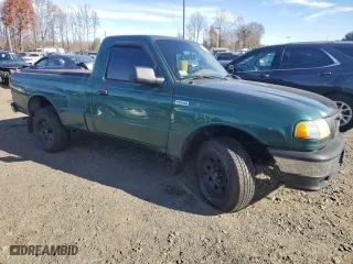 1999 Mazda B-Series 2WD Truck SX with VIN 4F4YR12CXXTM22301, listed as a Copart auction lot 80465464 with 98,031 mi miles and Salvage Title. Bid and sale history available at carsss.com. Image 4.