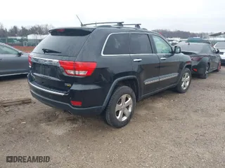 2013 Jeep Grand Cherokee Limited with VIN 1C4RJFBG0DC656382, listed as a IAAI auction lot 41870162 with 162,869 mi miles. Bid and sale history available at carsss.com. Image 4.