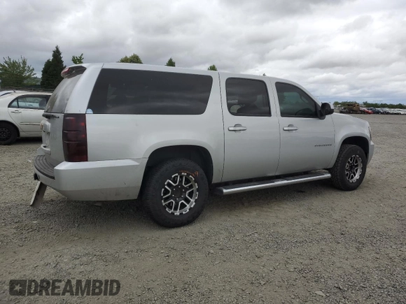 2013 Chevrolet Suburban LS with VIN 1GNSKHE77DR311408, listed as a Copart auction lot 59977394 with 216,161 mi miles and Salvage Title. Bid and sale history available at carsss.com. Image 3.