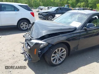 2018 BMW 3 Series 320i xDrive with VIN WBA8A3C5XJA505576, listed as a IAAI auction lot 42248730 with Not provided miles and . Bid and sale history available at DreamBid. Image 6.