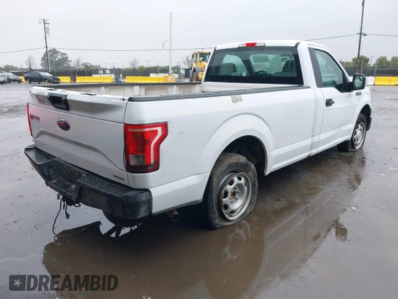 2016 Ford F-150 XL with VIN 1FTMF1C89GKF71802, listed as a IAAI auction lot 41557014 with 129,794 mi miles. Bid and sale history available at carsss.com. Image 4.