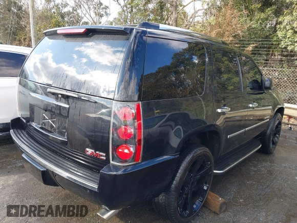 2011 GMC Yukon Denali with VIN 1GKS2EEF6BR257194, listed as a IAAI auction lot 41619864 with 183,057 mi miles. Bid and sale history available at carsss.com. Image 4.