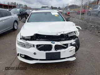 2014 BMW 4 Series 428i with VIN WBA3N3C58EF712202, listed as a IAAI auction lot 41843517 with 90,958 mi miles and . Bid and sale history available at DreamBid. Image 13.