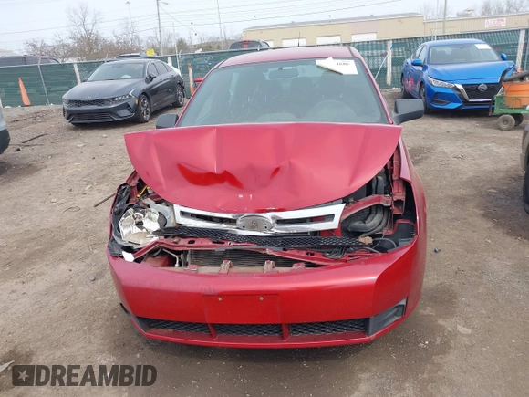 2009 Ford Focus SE z VIN 1FAHP35N69W197700, wystawiony jako IAAI lot #41834668 z przebiegiem 176 623 mil mil oraz . Historia ofert i sprzedaży dostępna na DreamBid. Obrazek 13.