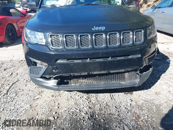2021 Jeep Compass Sport with VIN 3C4NJDAB9MT591500, listed as a IAAI auction lot 40517034 with 58,230 mi miles and . Bid and sale history available at DreamBid. Image 6.