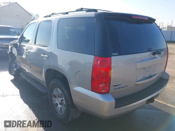 2007 GMC Yukon SLT with VIN 1GKFC13077J253697, listed as a IAAI auction lot 41277881 with 246,059 mi miles. Bid and sale history available at carsss.com. Image 3.