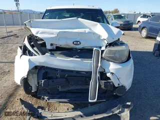 2015 Kia Soul with VIN KNDJN2A24F7181251, listed as a IAAI auction lot 41988230 with 128,894 mi miles. Bid and sale history available at carsss.com. Image 6.