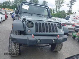 2015 Jeep Wrangler Unlimited Sport with VIN 1C4HJWDG1FL635620, listed as a IAAI auction lot 42396137 with 87,352 mi miles and . Bid and sale history available at DreamBid. Image 12.