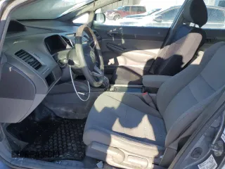 2010 Honda Civic z VIN 2HGFA1F25AH019647, wystawiony jako Copart lot #45129385 z przebiegiem 245 917 mil mil oraz Szkoda całkowita • Salvage title. Historia ofert i sprzedaży dostępna na DreamBid. Obrazek 7.