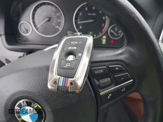 2014 BMW 5 Series 535i with VIN WBA5B1C57ED475963, listed as a IAAI auction lot 41914997 with 92,037 mi miles and . Bid and sale history available at DreamBid. Image 11.